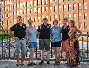 Group of Board Members in Front of the Dana Mill in Westbrook